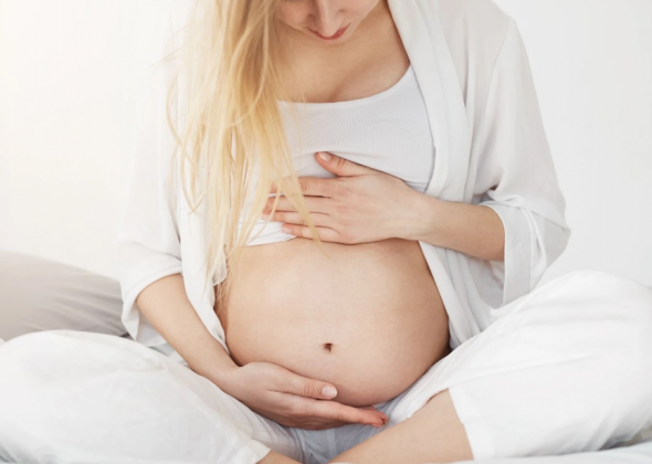 Біль у спині та тазу наприкінці вагітності: як відрізнити фізіологічні причини від патологічних
